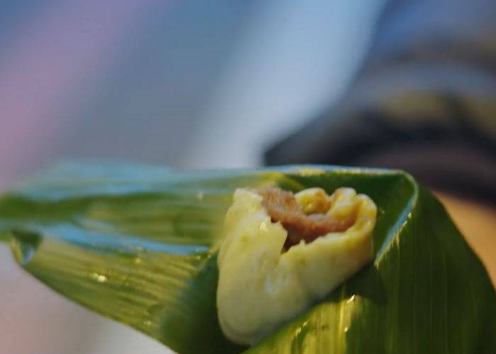 Sasamaki fu manju, a steamed bun wrapped in a leaf.